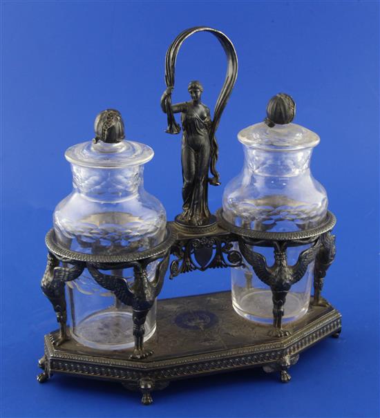 A late 19th/early 20th century French? white metal cruet stand, 8.75in.